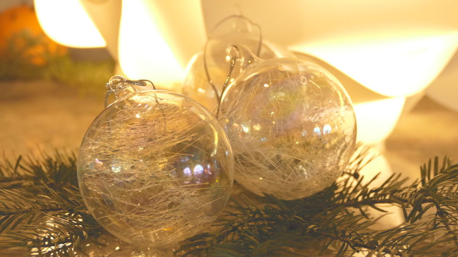 Close-up of illuminated christmas baubles