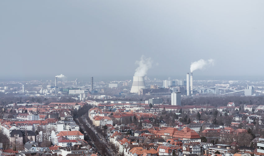 Skyline of berlin with power plant and smog