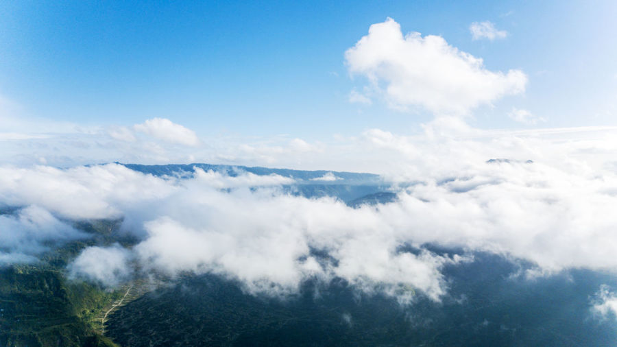 Aerial view of landscape with clouds