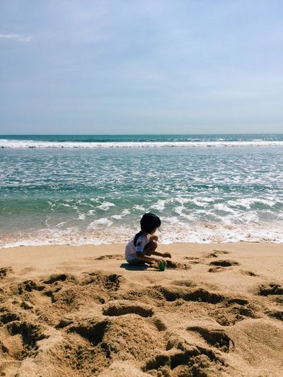 Scenic view of beach against sky