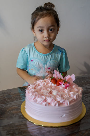 Asian cute little princess at 3rd birthday party.