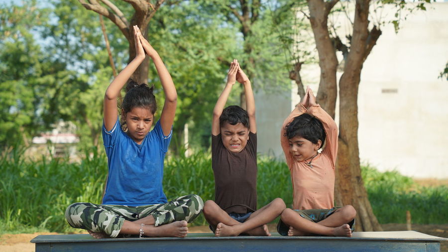 Yoga classes outside on the open air. kids yoga