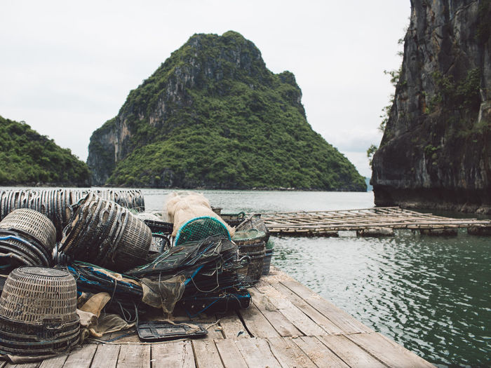 Fishing baskets on pier at halong bay