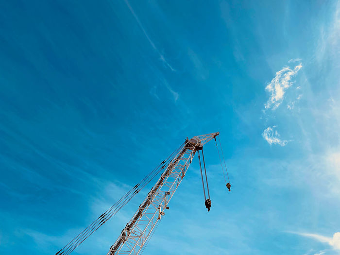 Crane against blue sky 