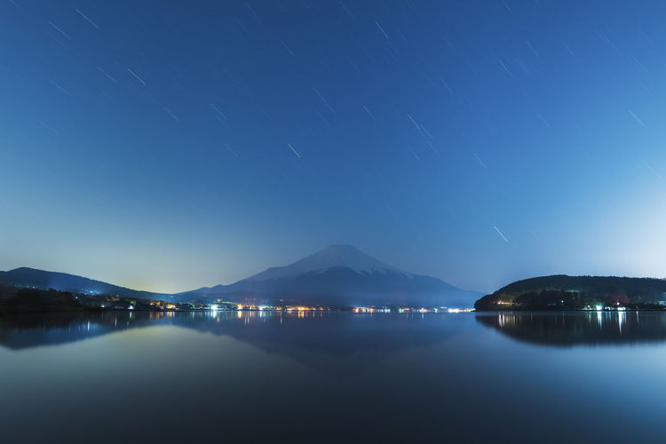 Night shot of mount fuji from lake yamanaka, yamanashi prefecture