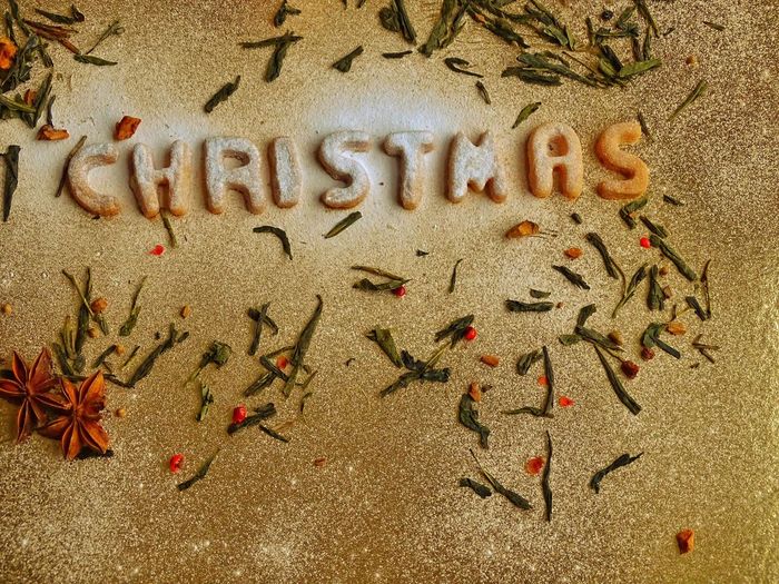 Close-up of christmas text on marble