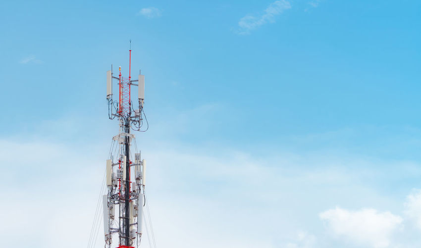 Telecommunication tower. antenna on blue sky. radio and satellite pole. communication technology.