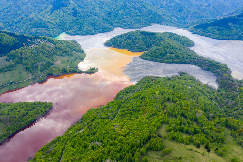 Aerial view of a big waste decanting lake, tailing pond. rosia poieni copper pit , geamana, romania
