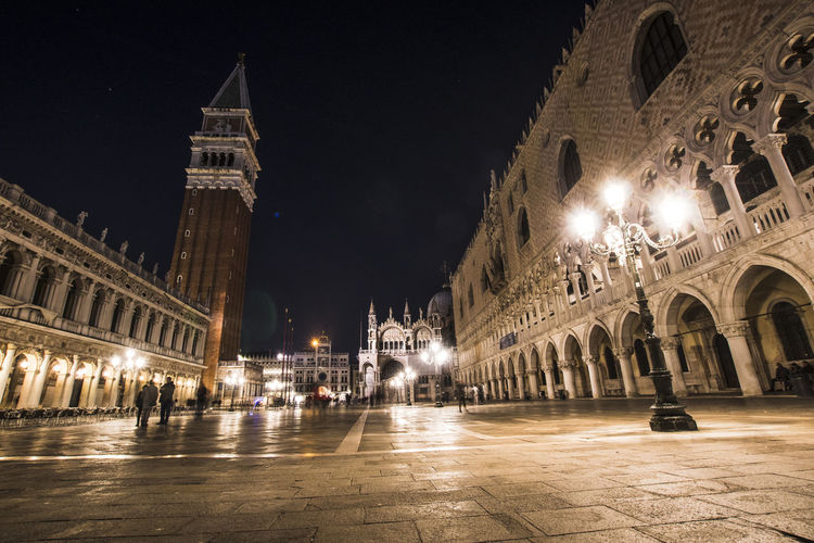 Illuminated doges palace - venice and st marks square against sky during night