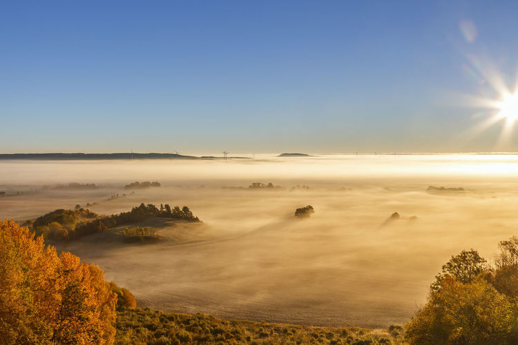 Fog over a rural landscape in the fall