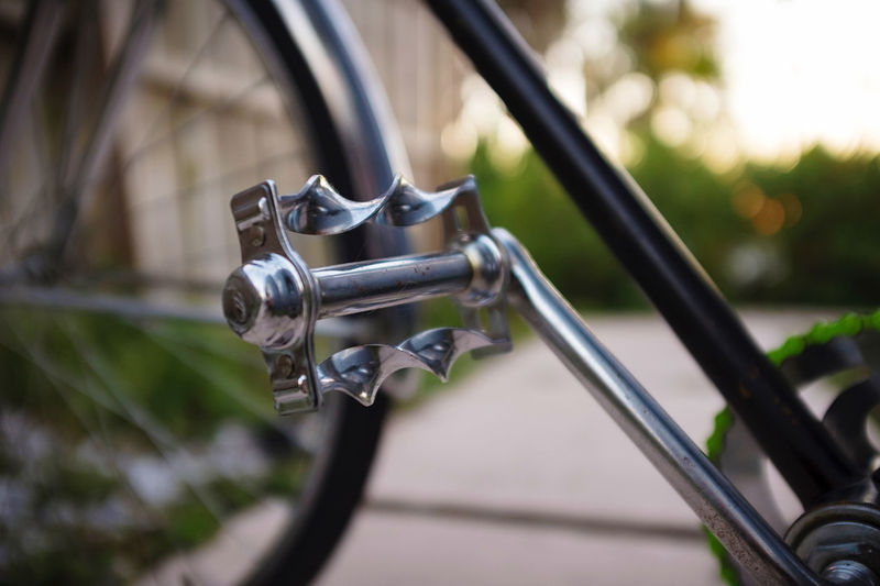 Close-up of bicycle on railing
