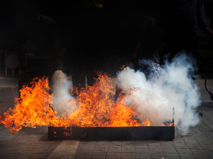 Fire fighting practice to black out fire on simulation exploration flame at property
