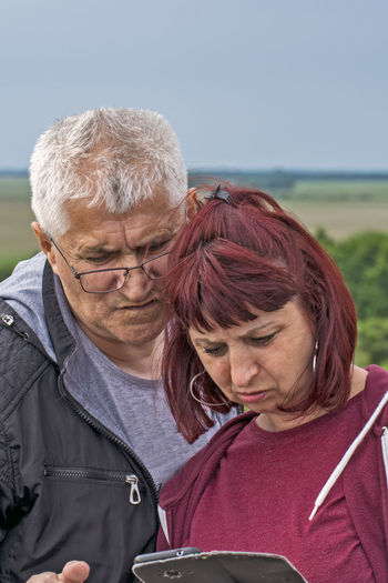 Close-up of couple kissing outdoors