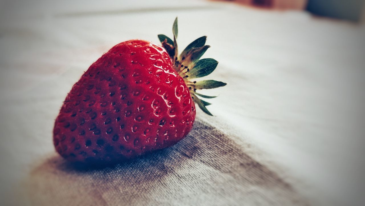 CLOSE-UP OF STRAWBERRIES