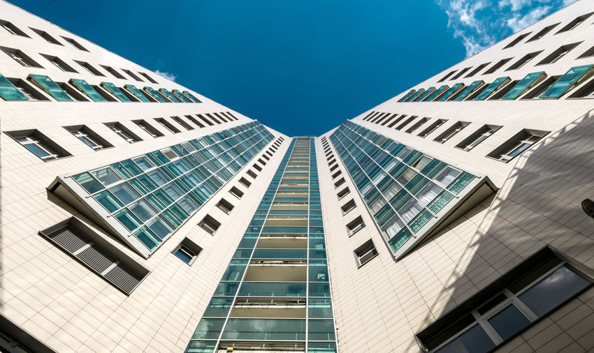 Sunny view of skyscraper external wall in moscow under blue sky in summer