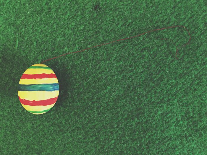 High angle view of soccer ball on grassy field
