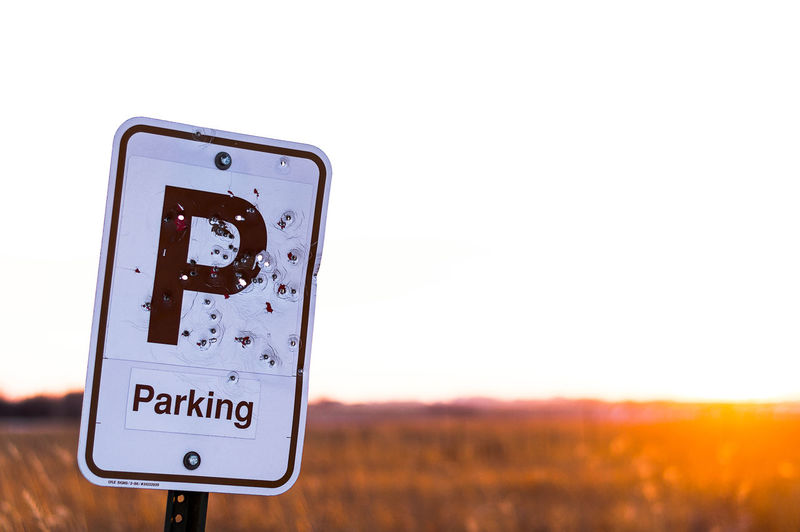 Low angle view of parking sign