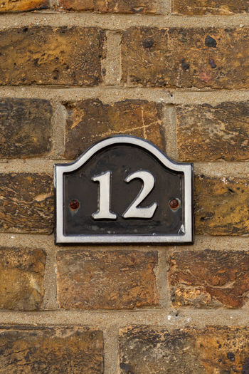 Close-up of number on wall
