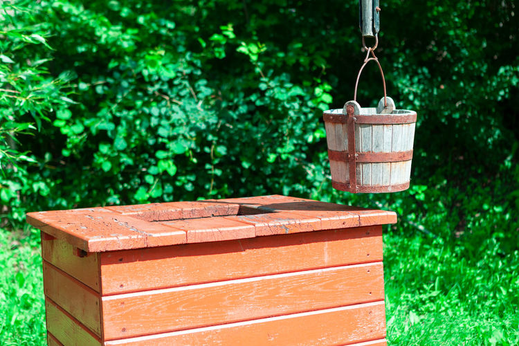 Well with wooden bucket . drinking water source