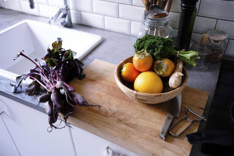 High angle view of fruits and vegetables on kitchen counter