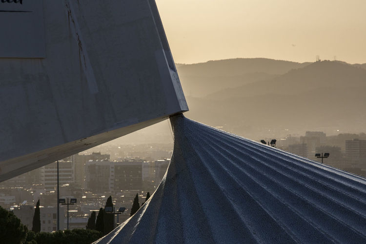 High angle view of tent by buildings in city against sky