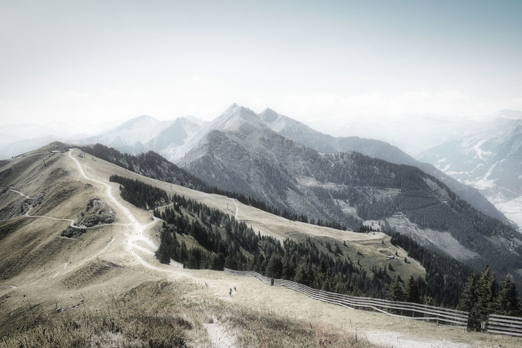 Scenic view of snowcapped mountains against sky
