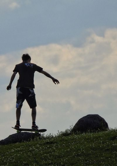 Full length of man standing on field
