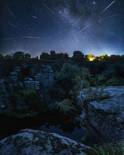 Scenic view of rocks at night