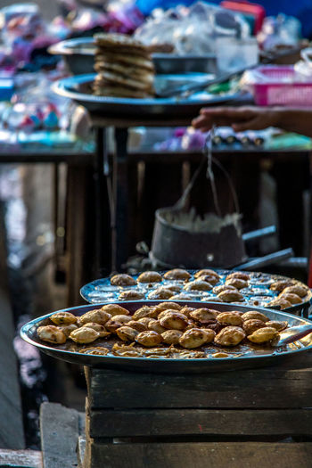 Street food on plate at market stall