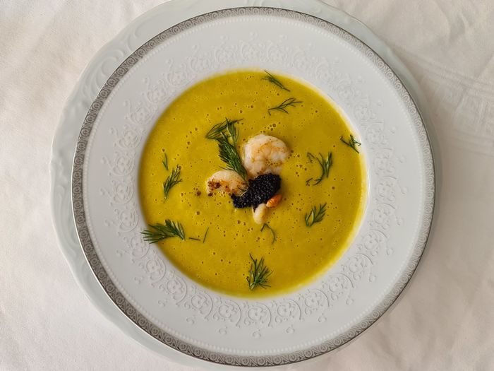High angle view of soup served on table