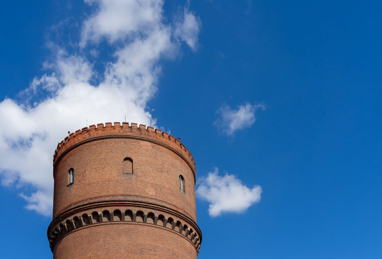 Low angle view of old building against sky