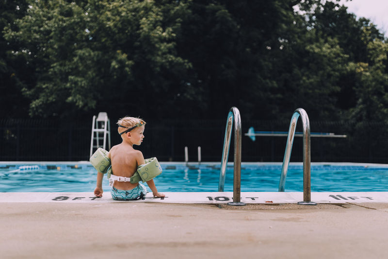 Children Swimming Blond Hair Boys Child Childhood Day Leisure Activity Lifestyles One Person Outdoors People Real People Swimming Pool Water
