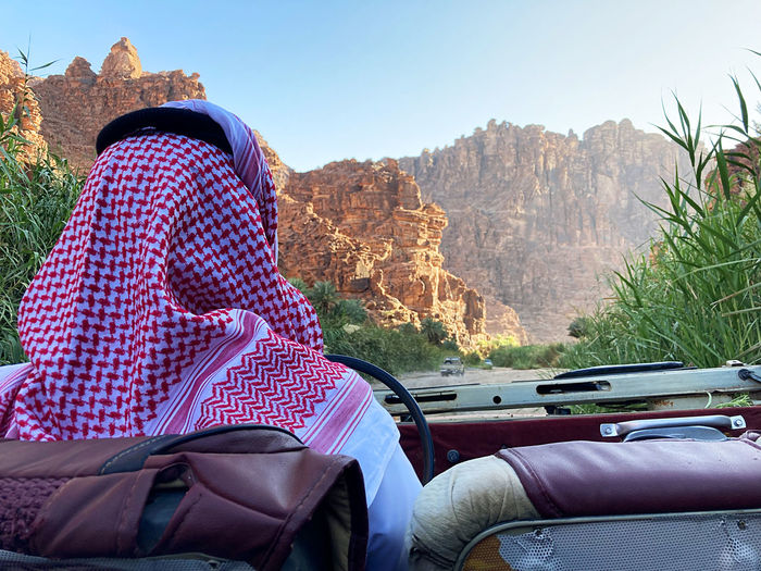 A saudi local tourist guide exploring the beautiful wadi disah