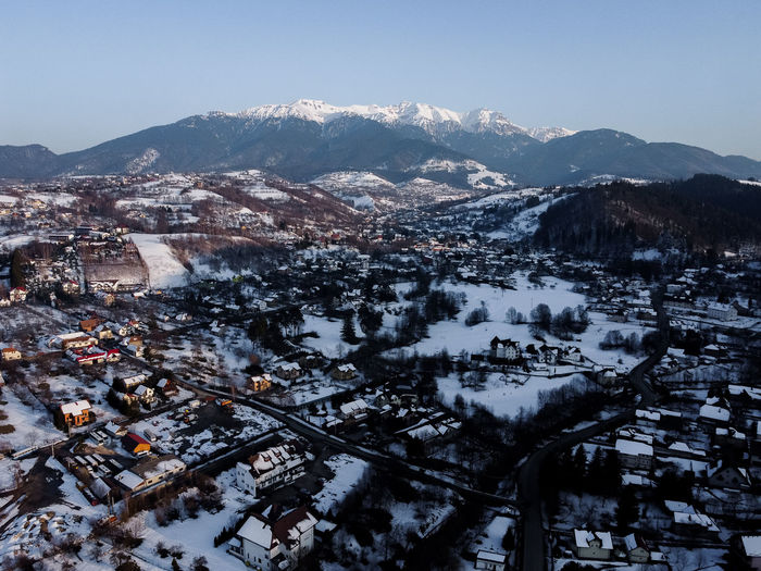 Bucegi mountains seen from the city of bran, romania. beautiful winter landscape. 