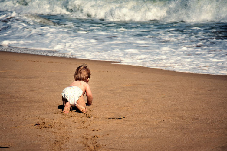 Baby boy on beach