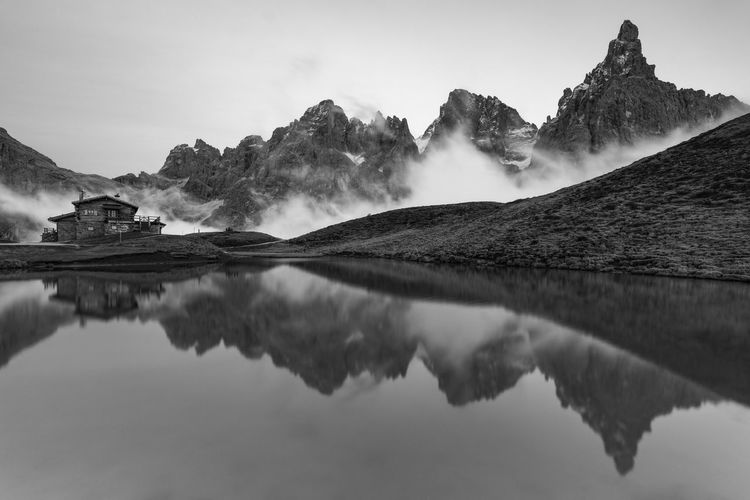 Scenic view of lake and mountains against sky in dolomites mountains 