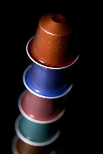 High angle view of coffee cup on black background