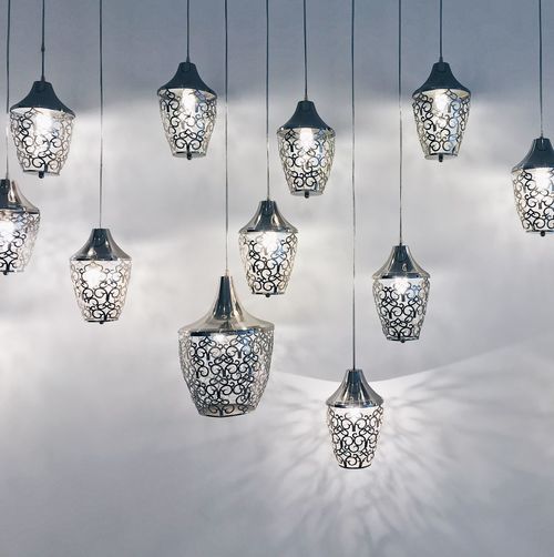 Illuminated pendant lights hanging from ceiling