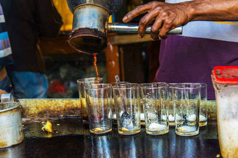 A tea seller prepares tea in his stall at khulna, bangladesh.