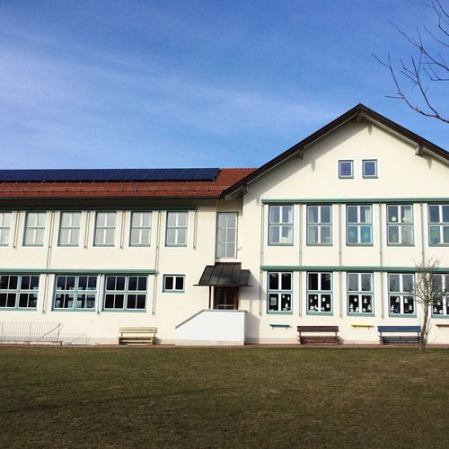 Exterior of school building against blue sky
