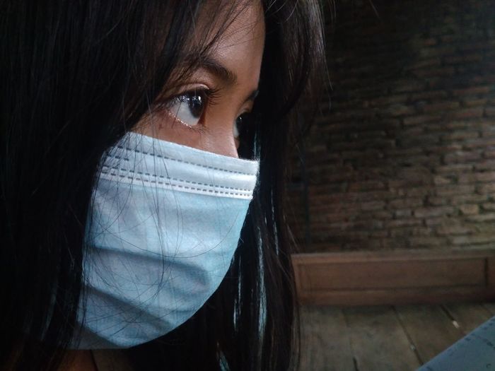 Indonesian girl wearing a mask