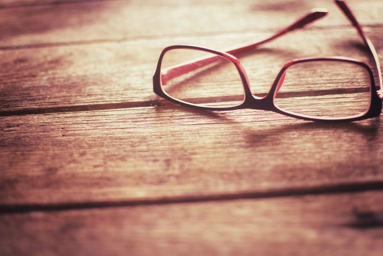 Close-up of eyeglasses on table