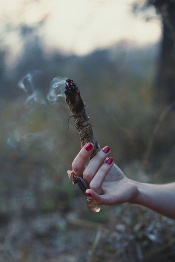 Close up smudging ritual concept photo