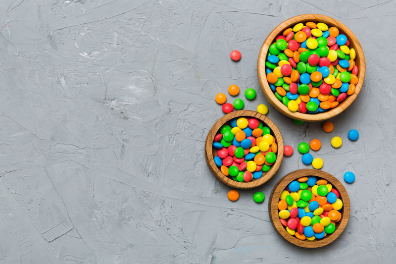 Directly above shot of multi colored candies on table