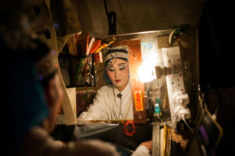 Opera actress preparing in dressing room