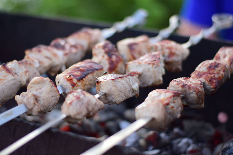Close-up of meat on barbecue grill
