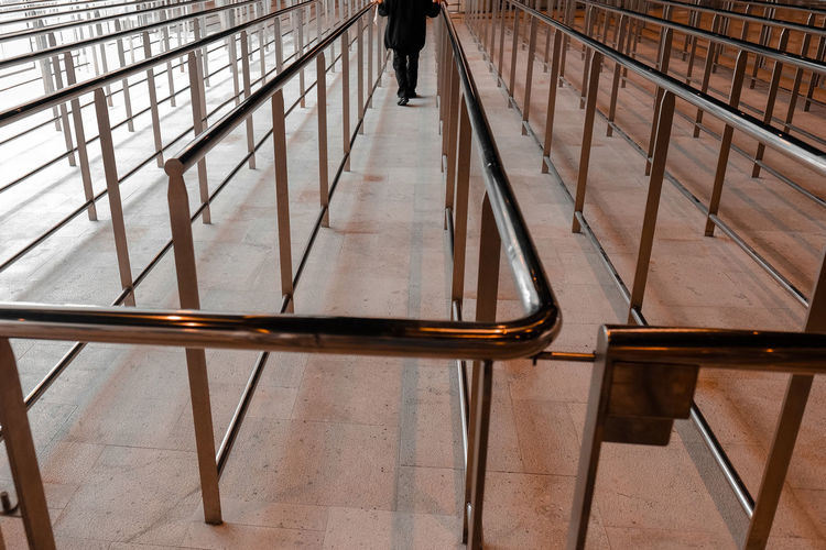 View of steel railing to empty visitors counter