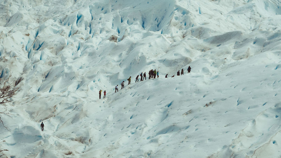 High angle view of people in snow