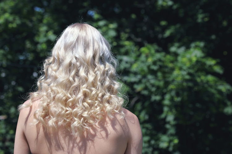 Rear view of woman with wavy hair 