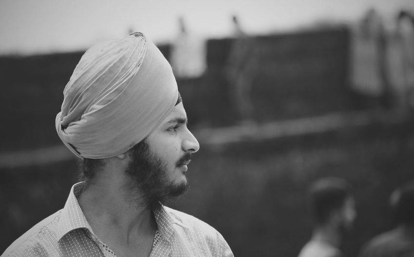Close-up of man wearing turban